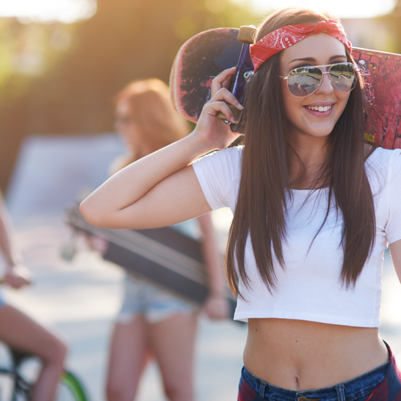 Denti e Sport Estivi: Proteggere il Sorriso Durante le Attività all’Aperto